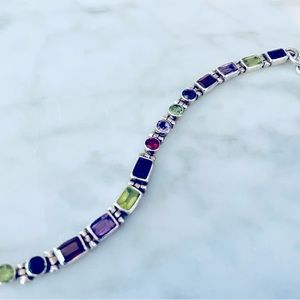 Rainbow of semiprecious stones set in sterling silver bracelet